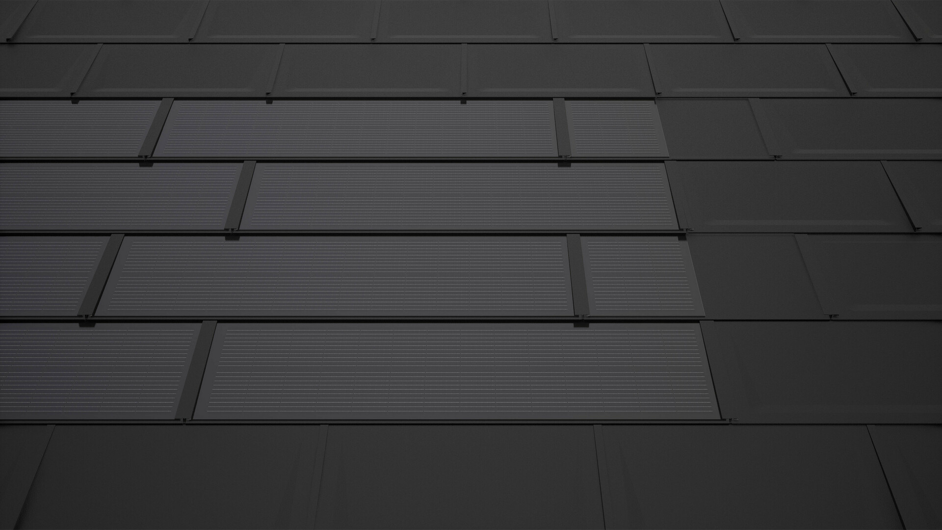 PREFA-solcelletagplade i sort med supplerende plade. Disse sikrer en rektangulær modulflade og bidrager til et harmonisk helhedsindtryk på solcelletaget.