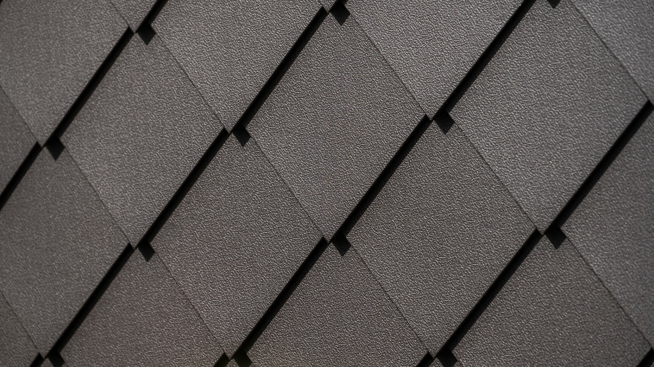 PREFA-vægrombe 29 × 29 i nøddebrun nærbillede med stucco-overflade